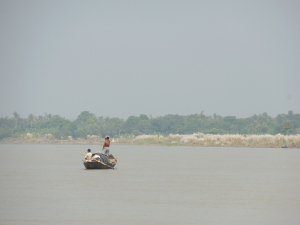the picture of clean river Hooghly after removal of the remains of idols and other debris.
